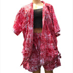 Red and white patterned kimono-style garment on a mannequin against a white background