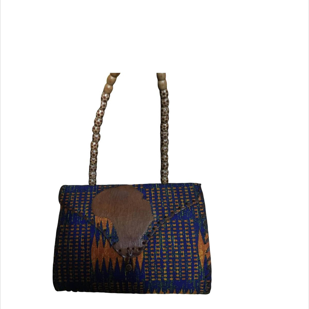 Woven handbag with blue and brown pattern on a white background