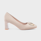 Beige high-heeled shoe with a gold buckle on a white background
