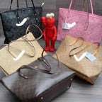 Collection of handbags on a wooden surface with a red figurine in the center.