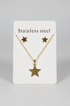 Star-shaped necklace on a card labeled 'Stainless steel' with a dark background