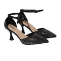 Black high-heeled shoes with rhinestone embellishments on a white background