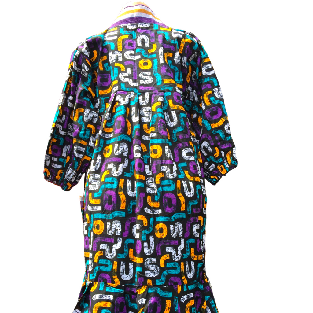 Colorful patterned dress on a white background