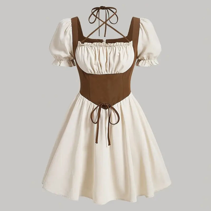 Two-tone dress with brown bodice and white skirt on a gray background