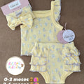 Baby outfit set with ruffled top and bloomers on a brown background, featuring 'Kitty Kids' branding.