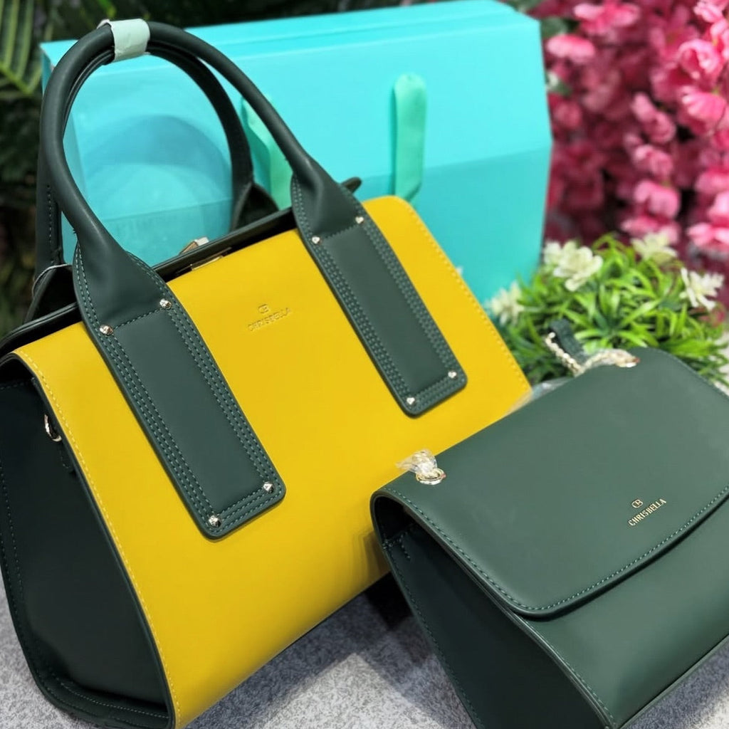 Two handbags, one yellow and one green, with a blurred floral background.