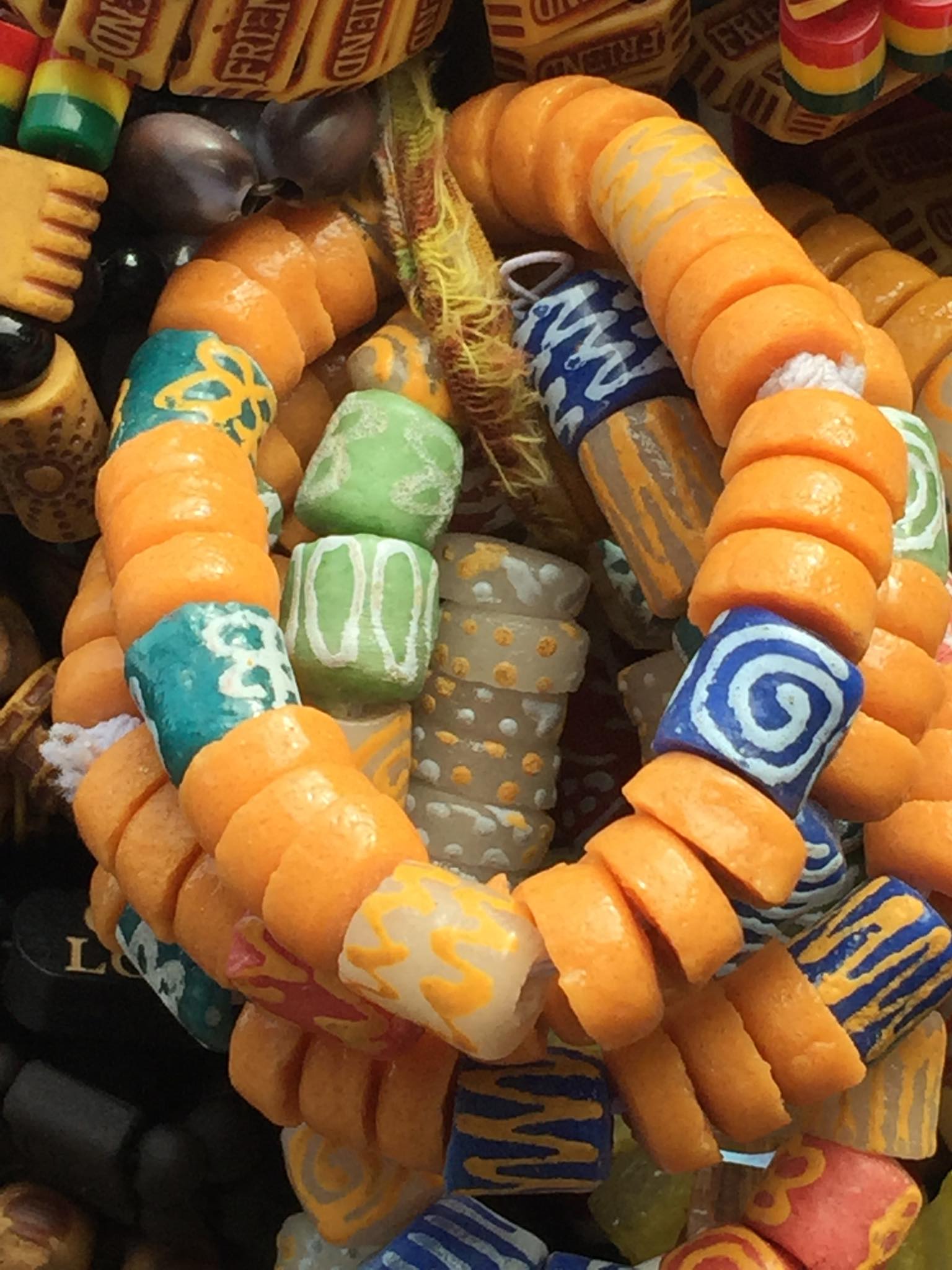Colorful dog chew toy with various patterns and textures.