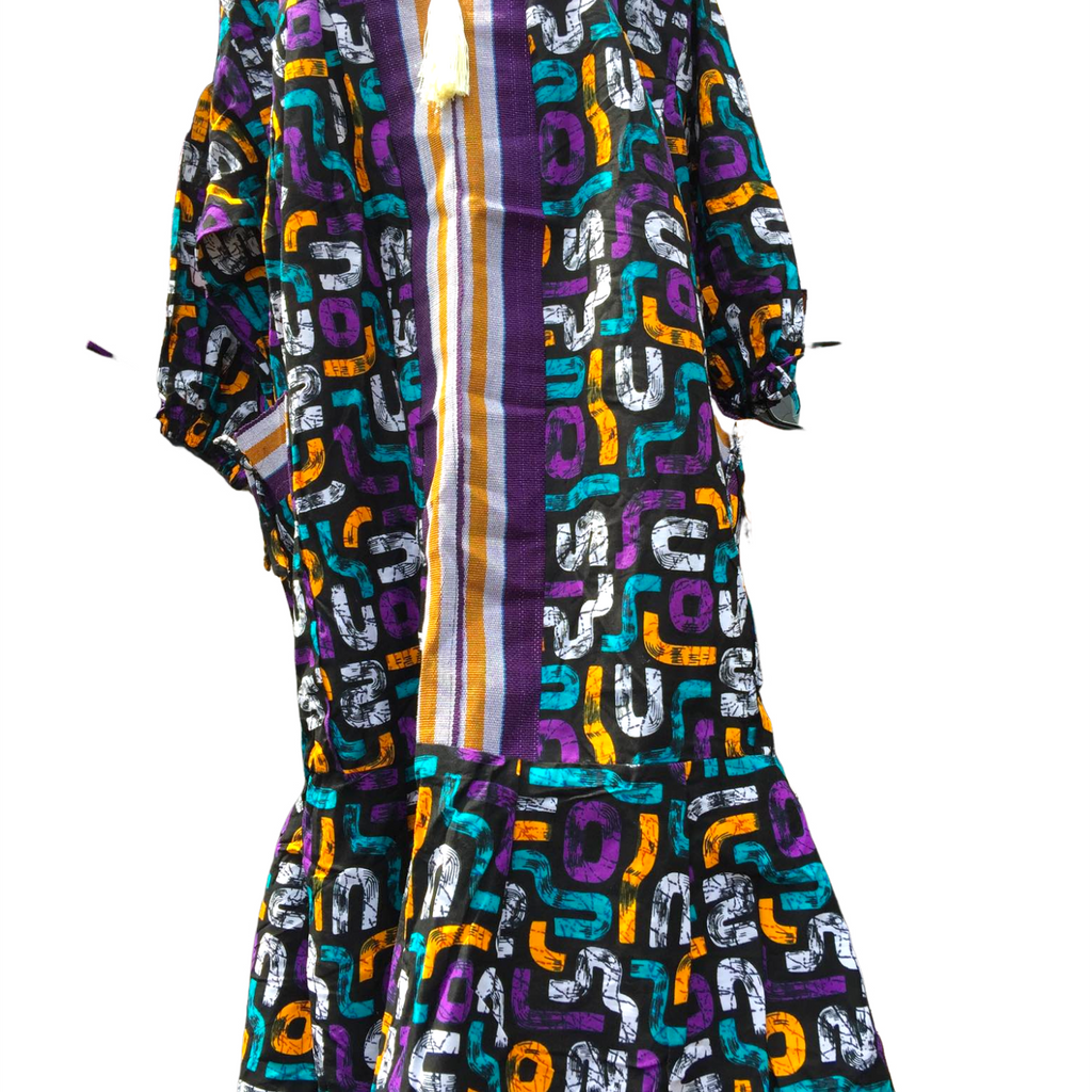 Colorful patterned dress with a white background