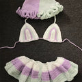 Crocheted bikini set with matching headband on a dark background