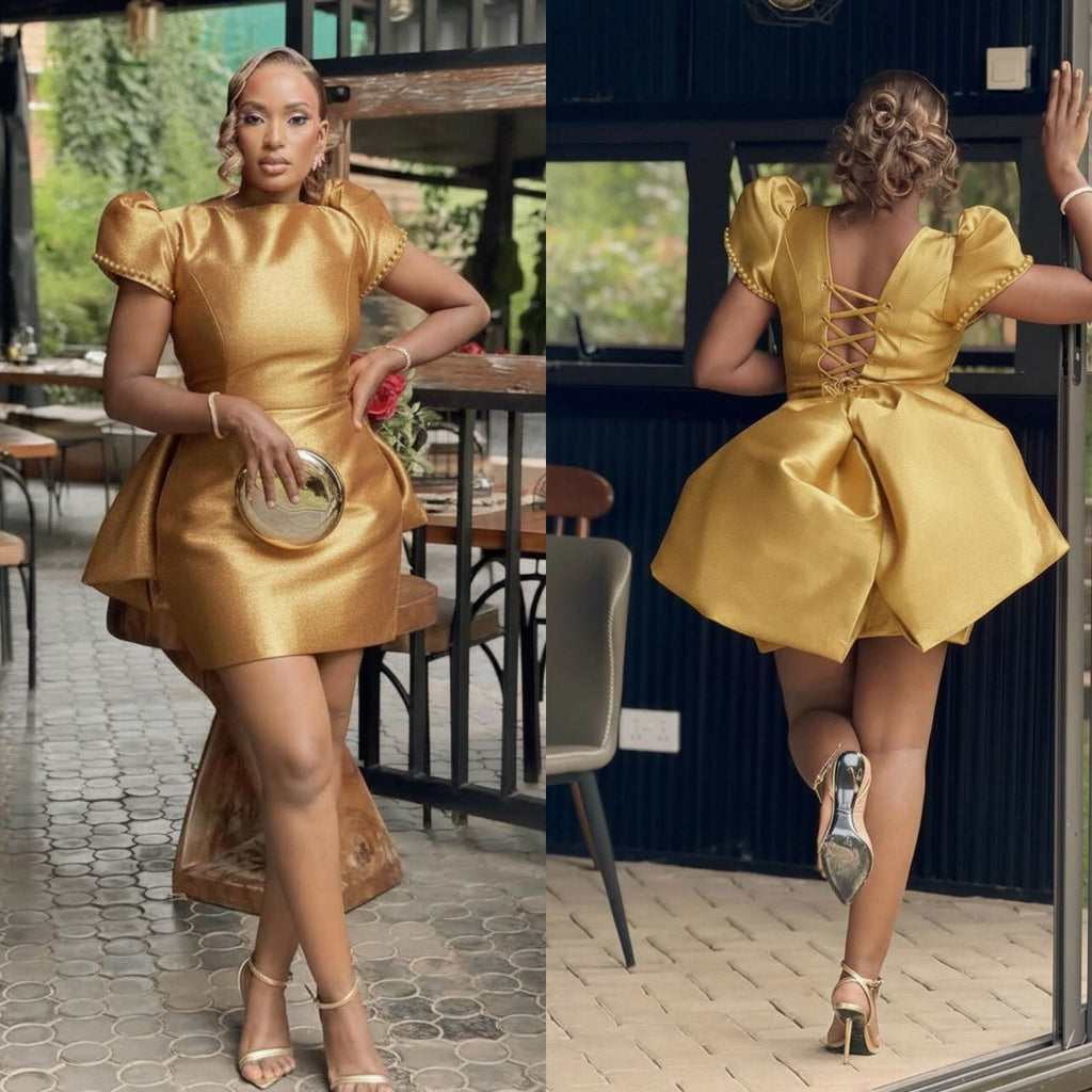 Woman in a gold dress posing outdoors and at a door.