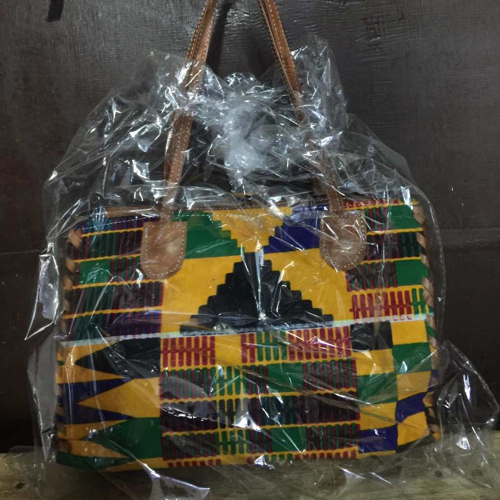 Colorful patterned bag wrapped in plastic with a colorful background