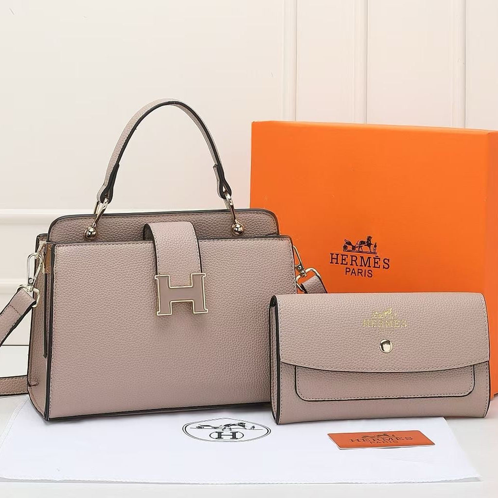 Hermes handbag and wallet set with orange box on a white background