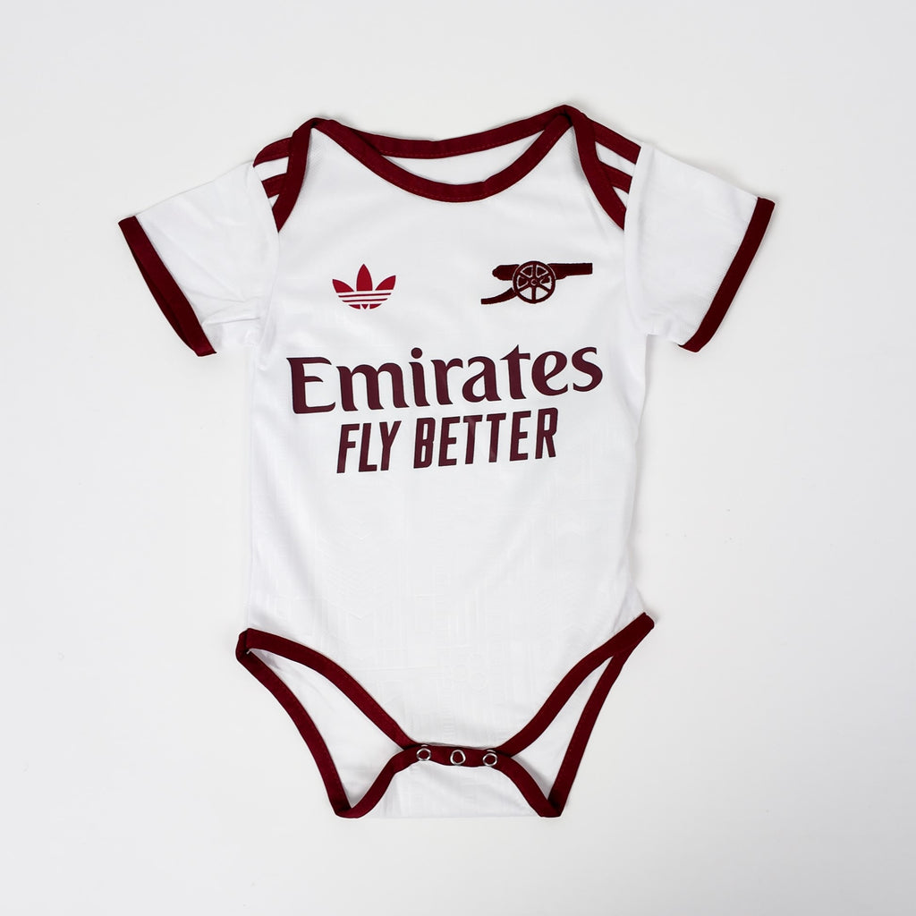 Baby onesie with Emirates branding on a white background