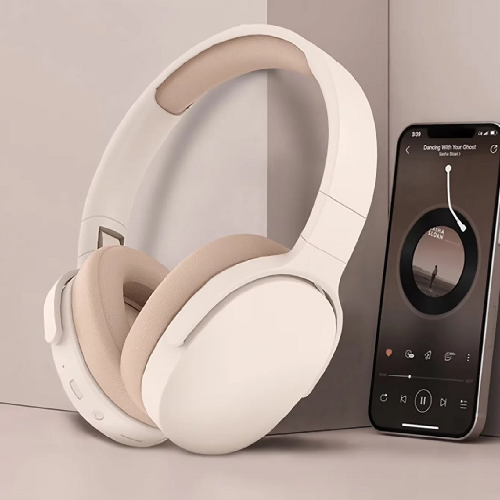 White wireless headphones with a smartphone displaying audio controls on a beige background