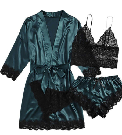 Teal satin robe with black lace trim and matching bra and panties set on a white background
