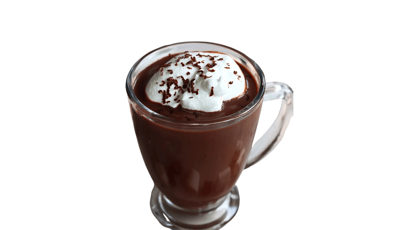 Glass mug of hot chocolate with whipped cream and chocolate shavings on a white background