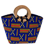 Tote bag with blue and red pattern and wooden handle on a white background