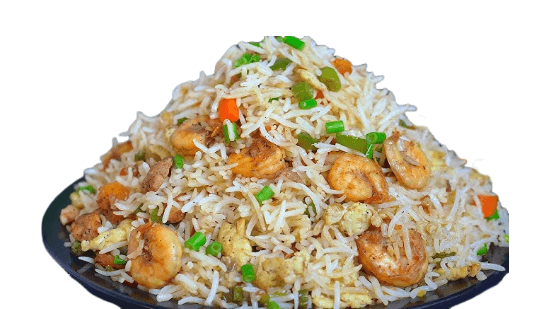 Plated dish of fried rice with shrimp and vegetables on a white background. Mixed rice from Town Bakery