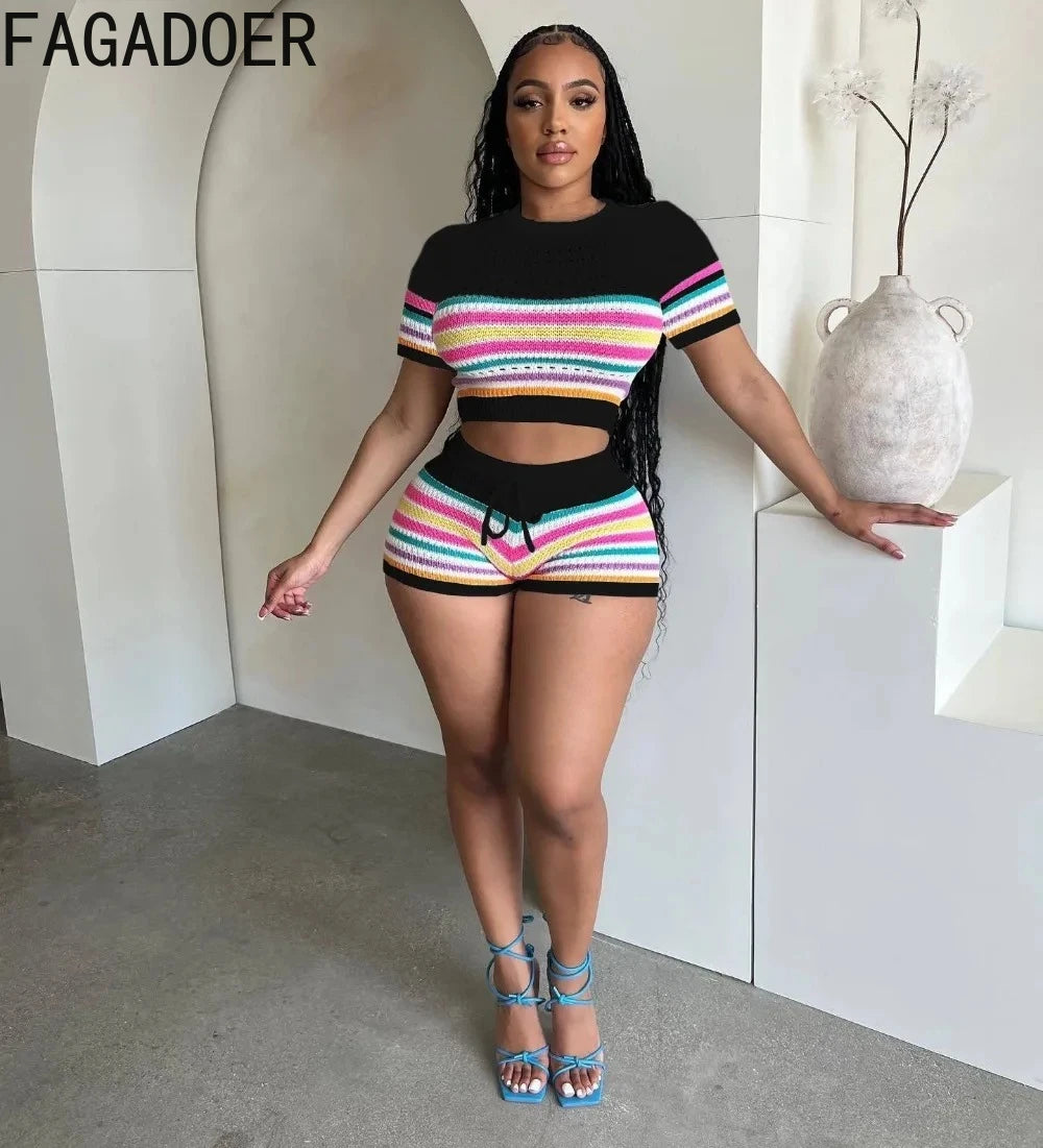 Woman wearing a colorful striped outfit with 'FAGADOER' branding.