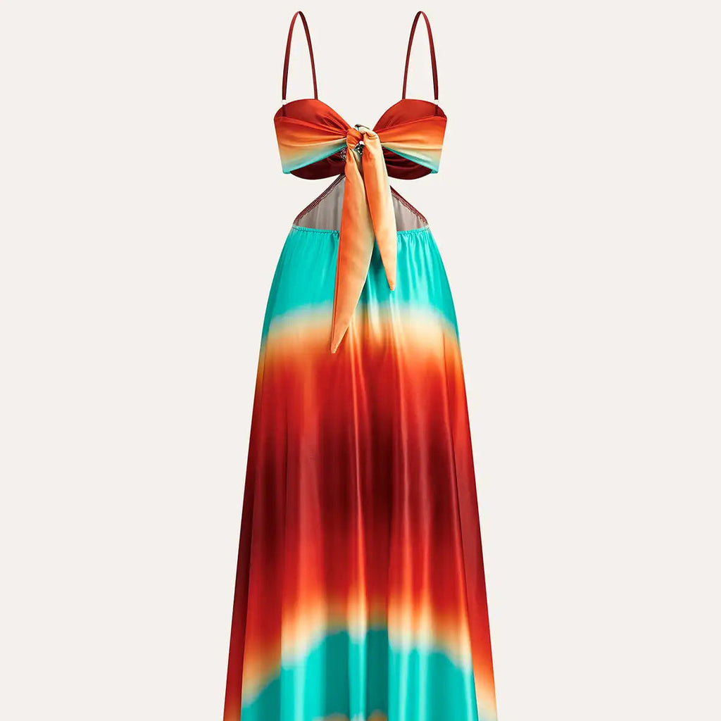 Colorful tie-dye dress with a gradient from red to blue on a white background