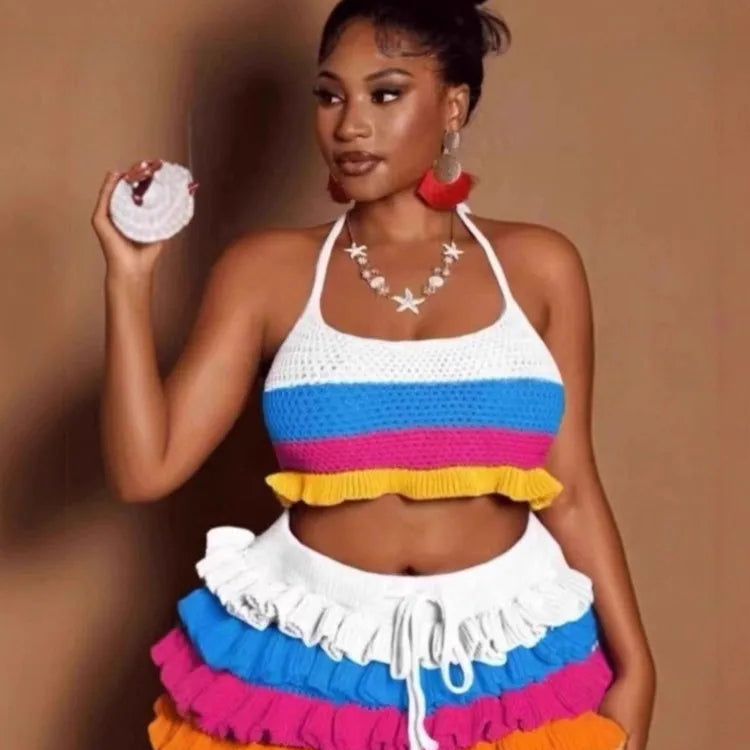 Woman wearing a colorful outfit with a white background