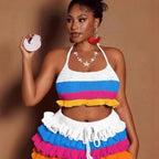 Woman wearing a colorful outfit with a white background
