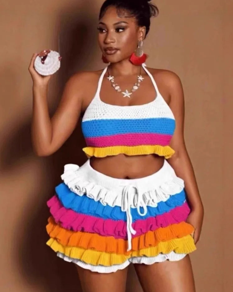 Woman wearing a colorful outfit with a white background