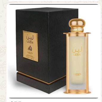Perfume bottles with gold accents displayed on a screen.