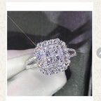 Silver ring with gemstones displayed on a screen, likely from an online shopping app.