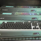 Stack of keyboards on a shelf with a price tag visible
