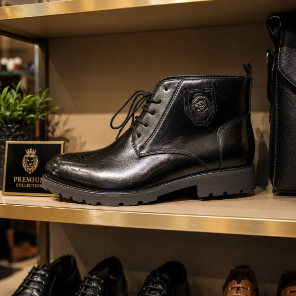 Black leather boot on a shelf with a 'Premium Collection' sign in the background
