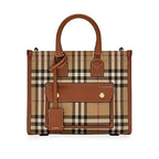 Designer handbag with checkered pattern and brown leather accents on a white background