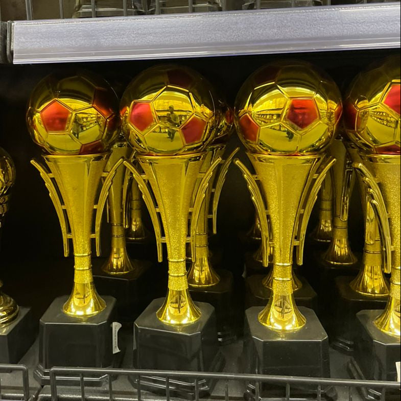 Golden soccer trophy