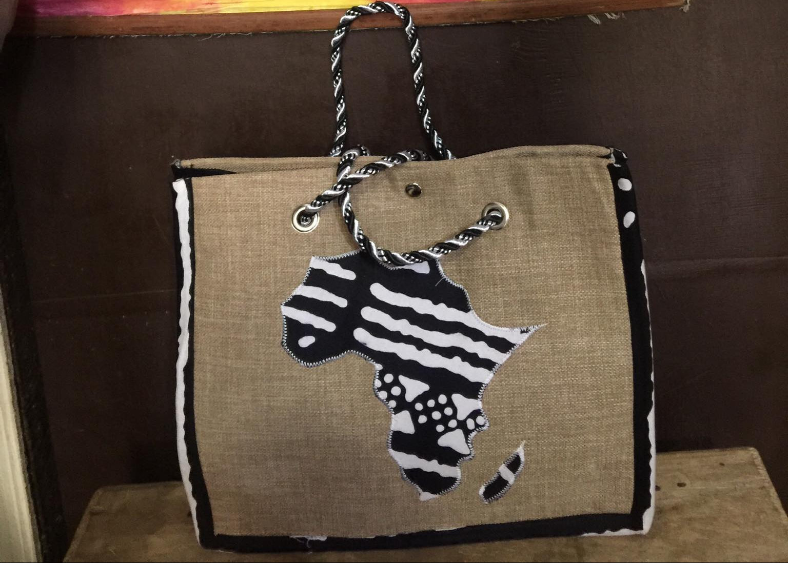 Textured bag with zebra design on a colorful background