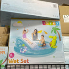Intex inflatable play set packaging on a store shelf with boxes stacked above.