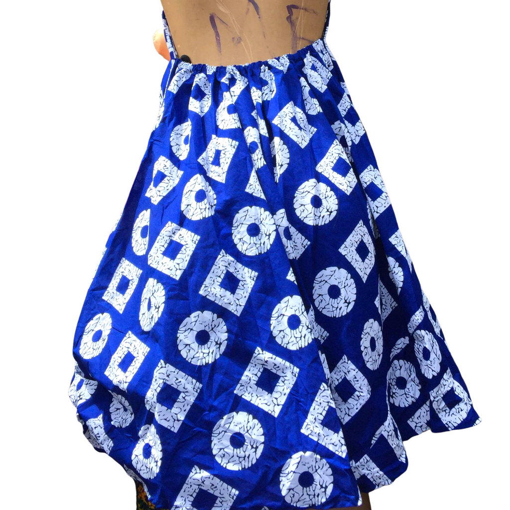 Blue and white patterned dress on a mannequin with a white background