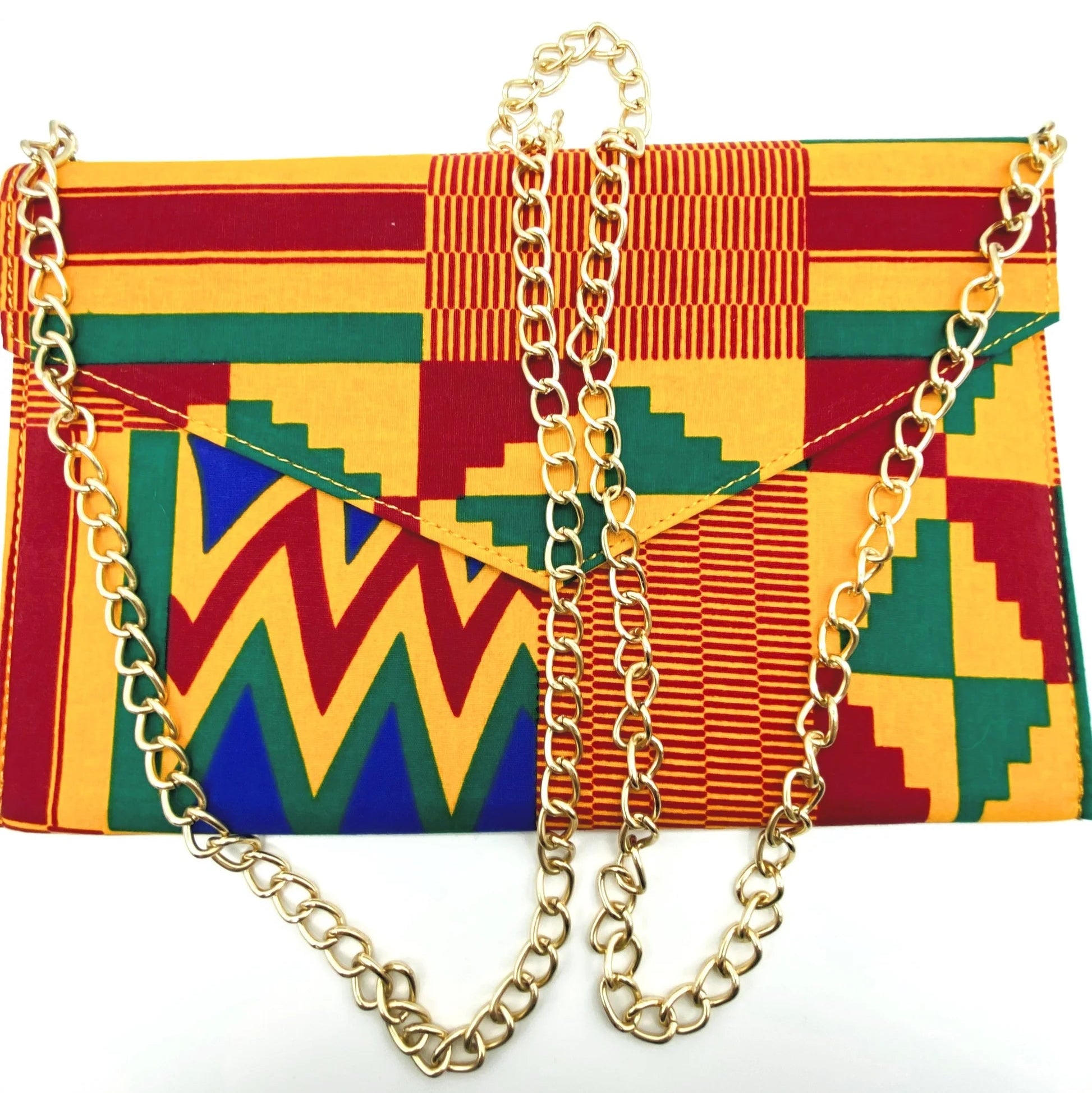Colorful geometric patterned clutch bag with gold chain strap on a white background