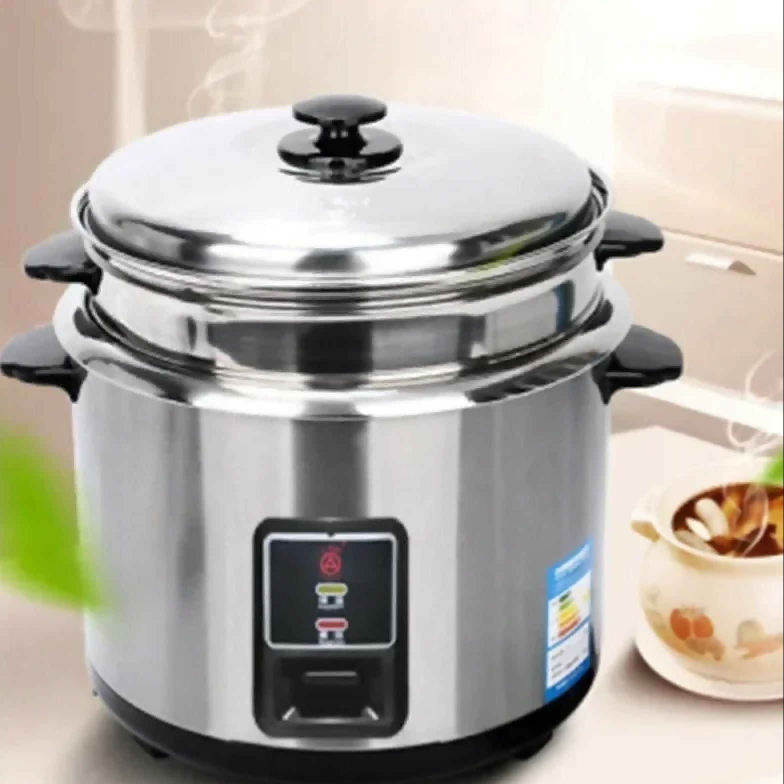 Stainless steel pressure cooker with a digital display on a neutral background